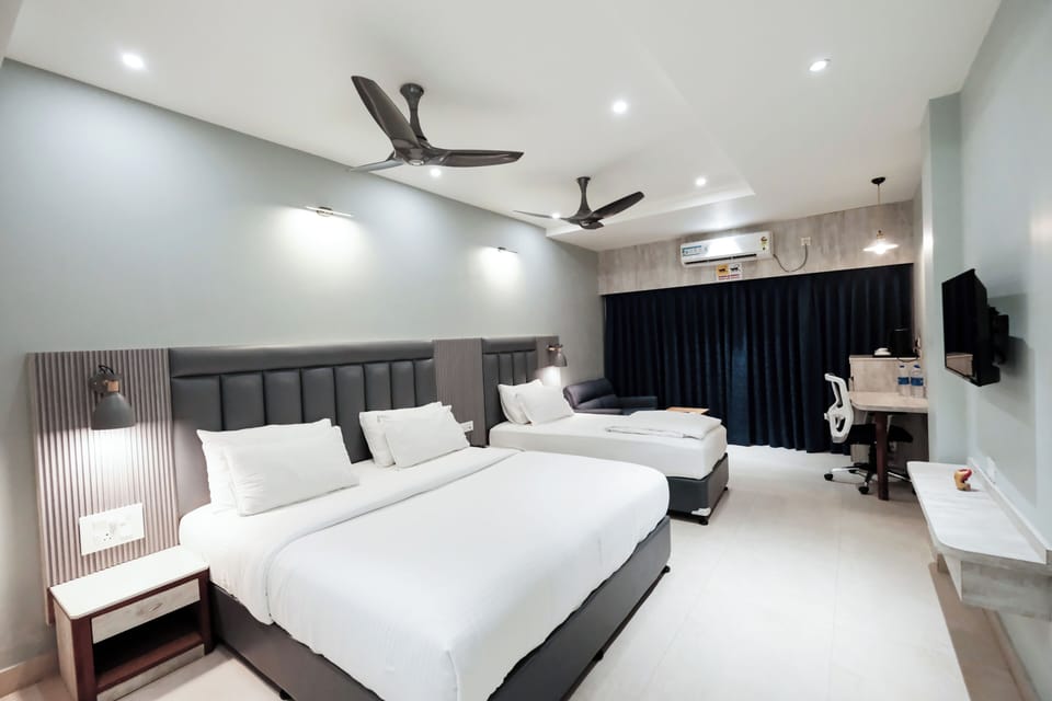 Superior Triple Room, Garden View | Pillowtop beds, desk, laptop workspace