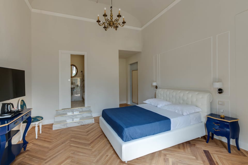 Quadruple Room, Multiple Beds (Bellariva) | In-room safe, individually decorated, individually furnished, desk