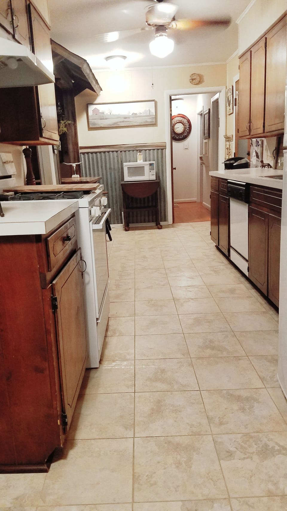 Looking at kitchen for the washer and dryer room