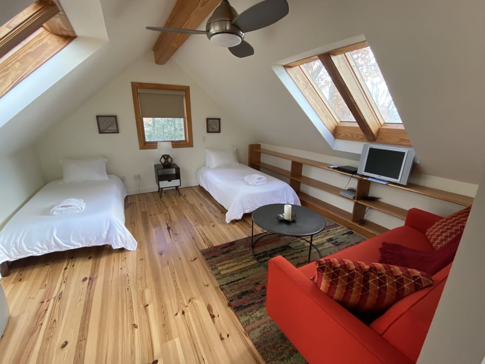 Twin beds with sofa