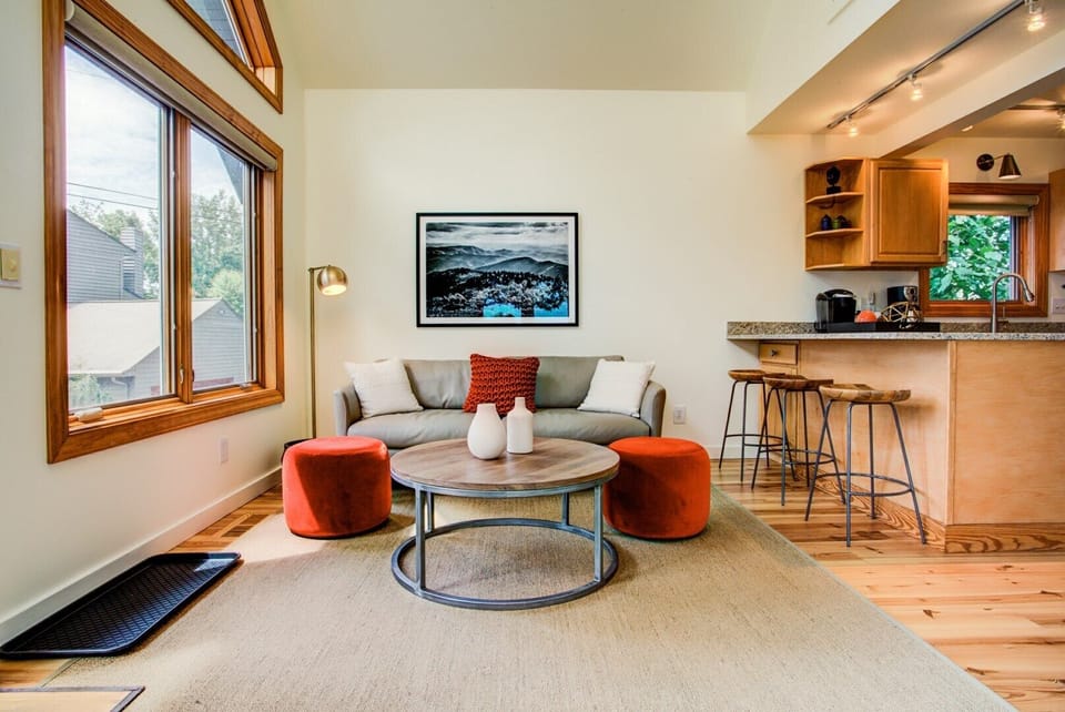 Kitchen bar seating and coffee table view