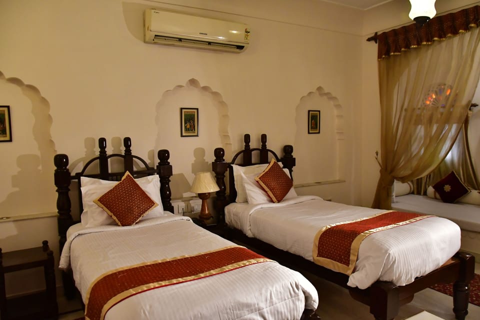 Deluxe Room | Premium bedding, minibar, desk, soundproofing