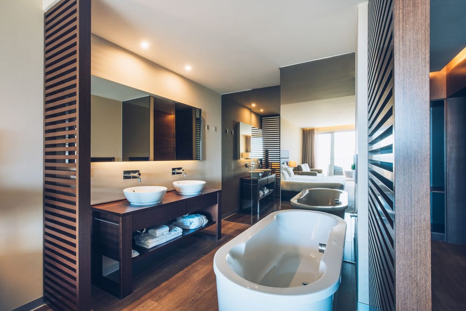 Separate tub and shower, deep soaking tub, eco-friendly toiletries