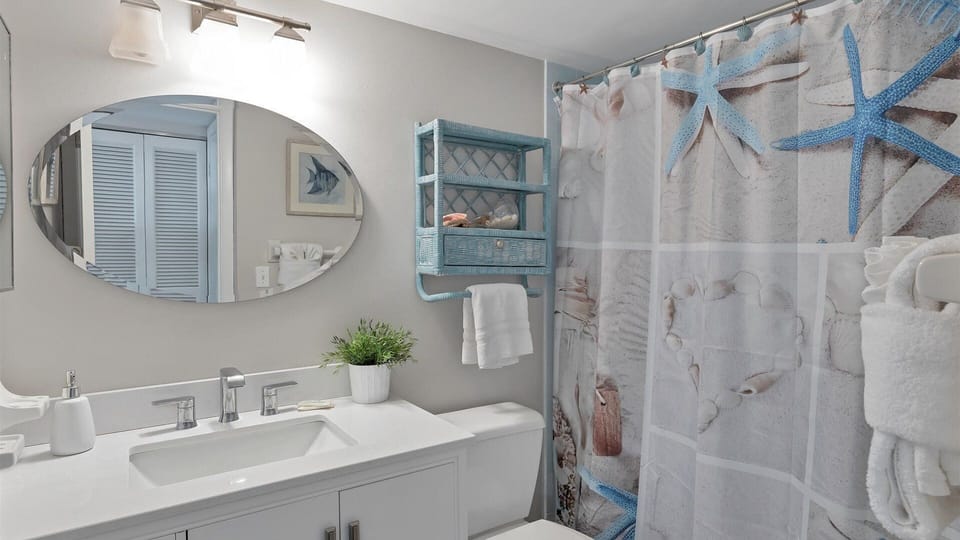 Bathroom 2
Shower/Tub Combo