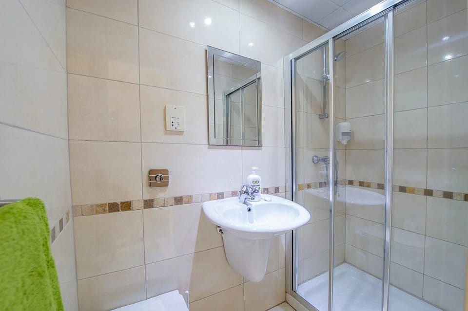Shower, towels, soap, shampoo