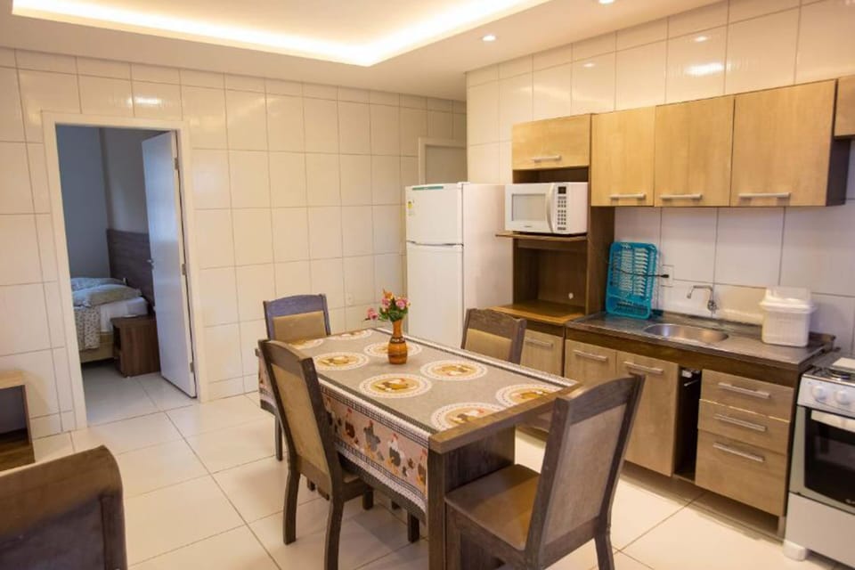 Comfort Chalet | Private kitchen | Fridge, microwave, stovetop, cookware/dishes/utensils