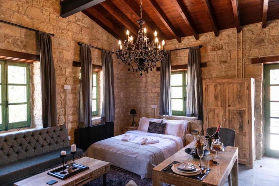 Champagne Suite | 1 bedroom, minibar, in-room safe, individually decorated