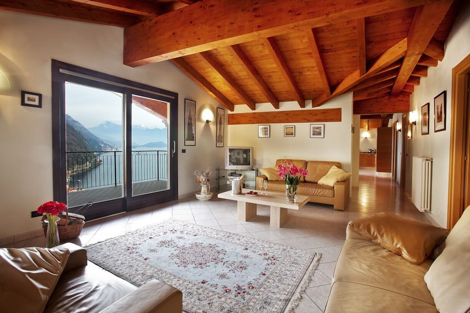 The penthouse boasts two comfy sofa's and a feature beam ceiling.