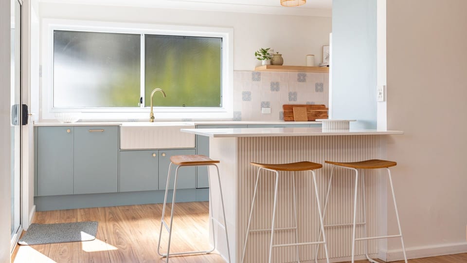 Kitchen with Island and Bar Stools