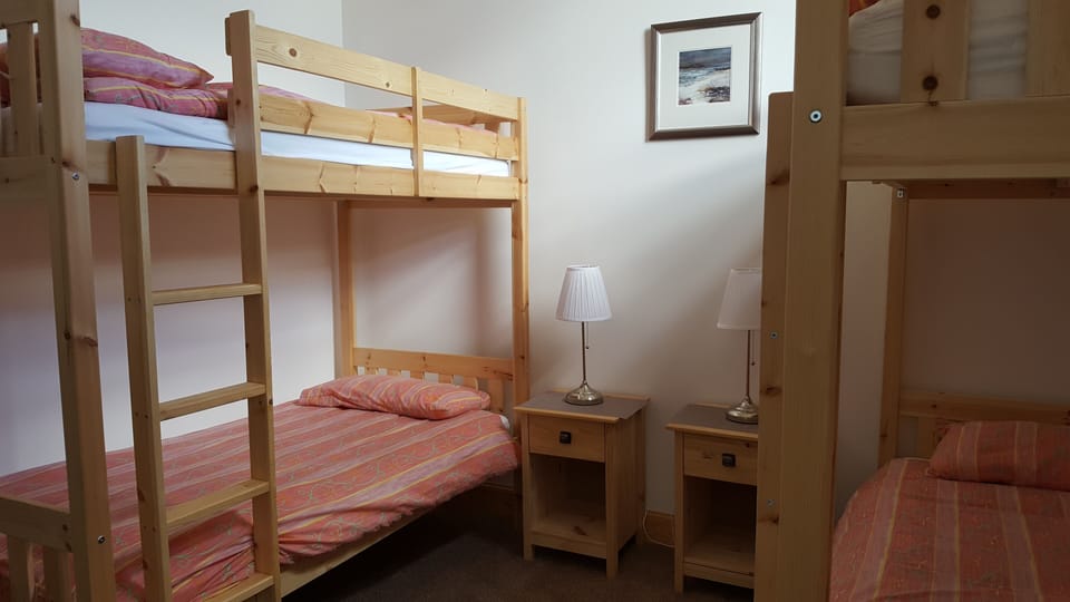 Quadruple Room (2 Sets of Adult Bunk Beds) | Soundproofing, iron/ironing board, free WiFi, bed sheets