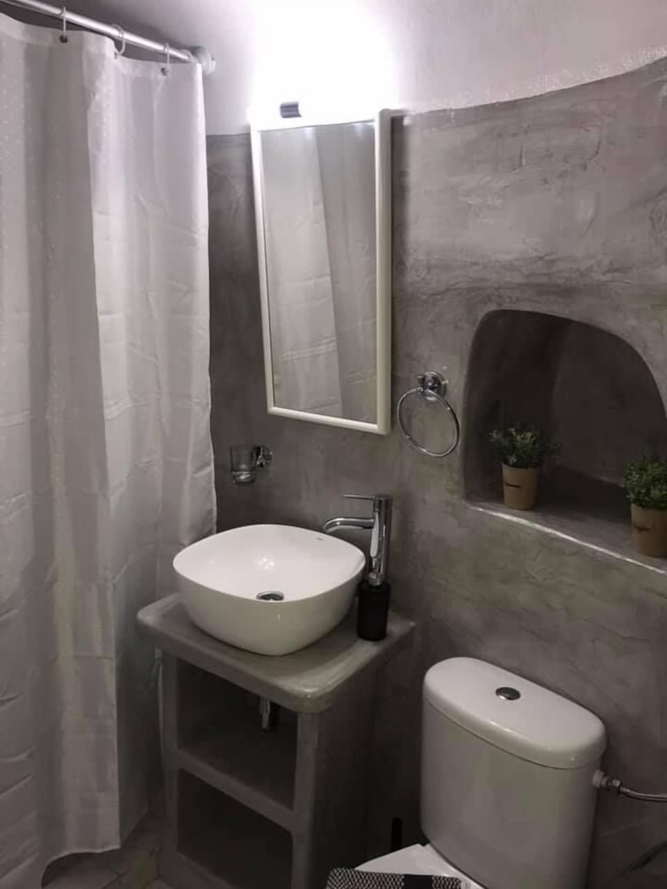 Cave House, Village View | Bathroom | Shower, towels