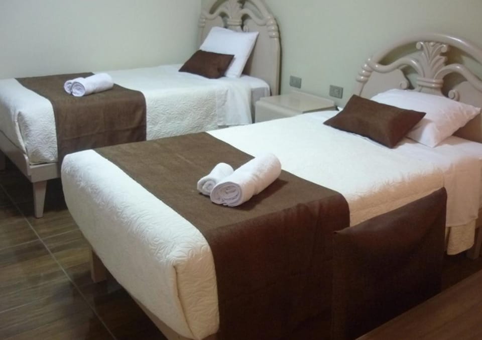 Desk, laptop workspace, free WiFi, bed sheets