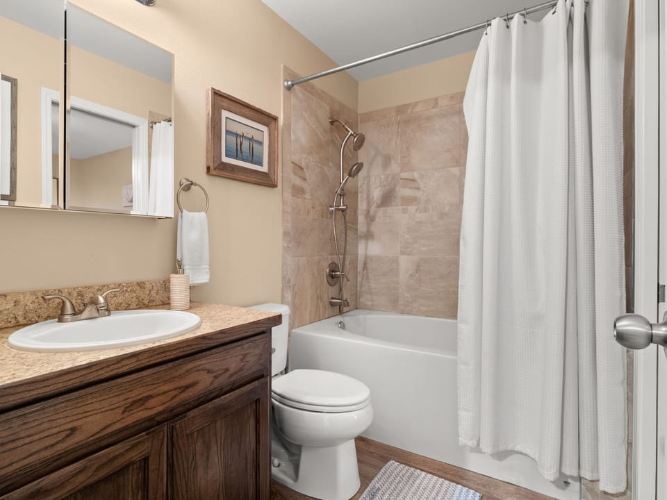 The bathroom next to bedroom #1 has a tub/shower combo.
