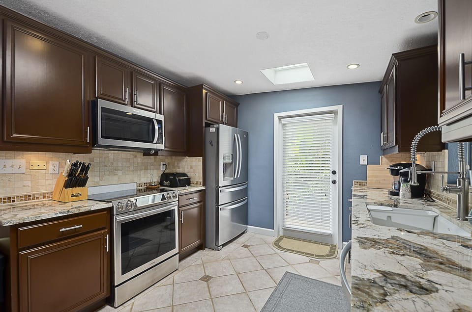 Kitchen with ALL the amenities... coffee maker, toaster, waffle iron.......