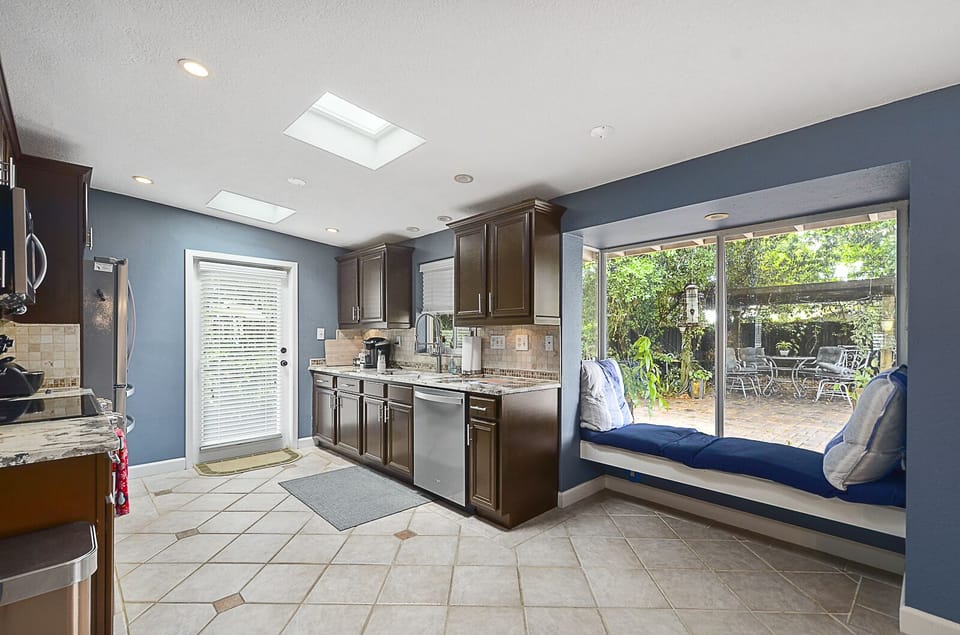 Kitchen with sitting area overlooking the backyard
