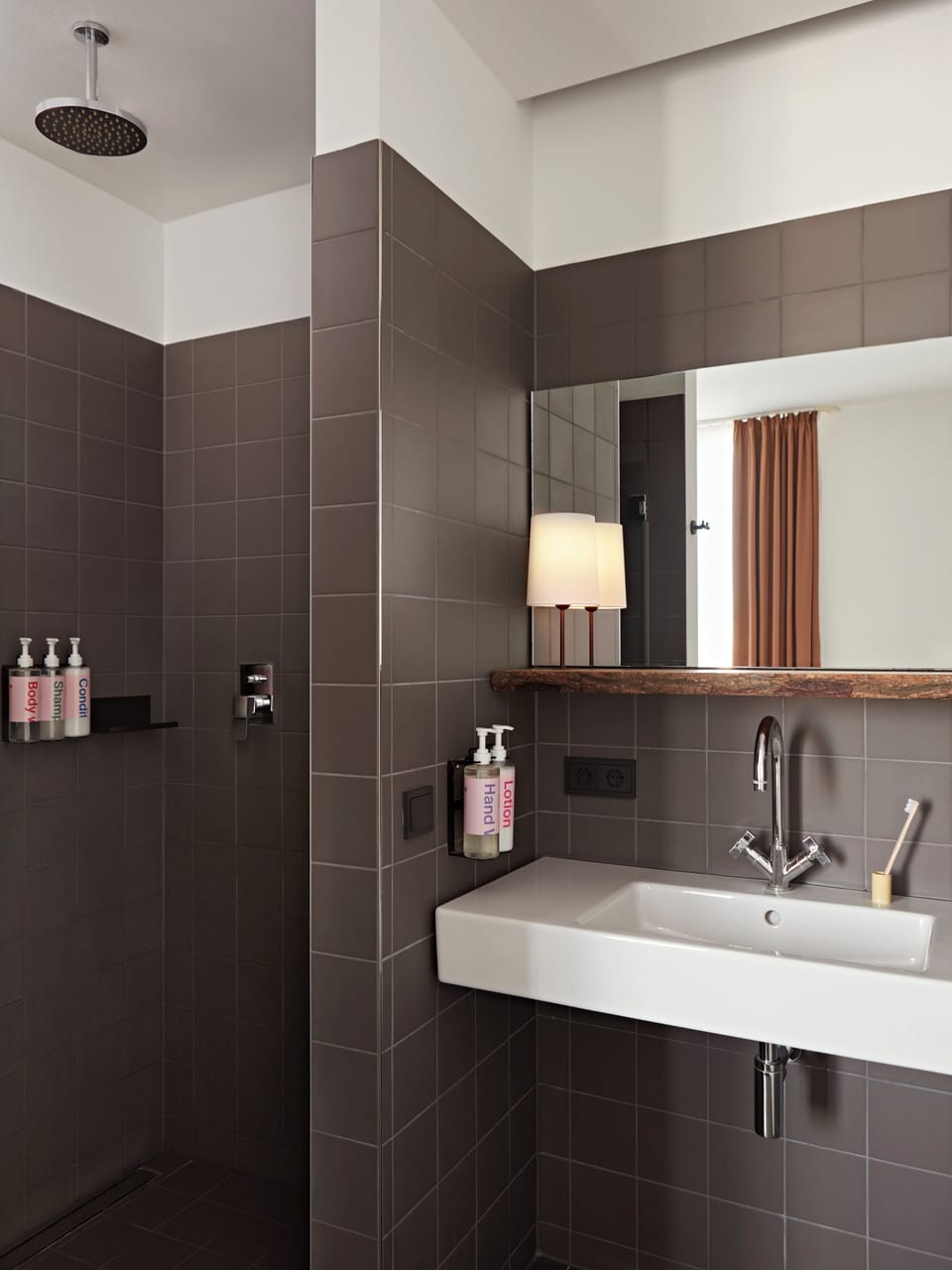 Designer toiletries, hair dryer, towels, soap