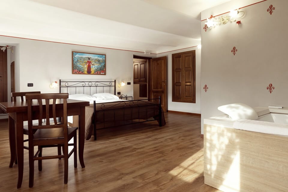 Double Room, Jetted Tub (Attico) | Individually decorated, individually furnished, free WiFi, bed sheets