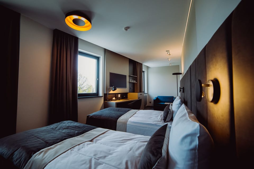 Standard Twin Room (Sofa) | Living area | Flat-screen TV