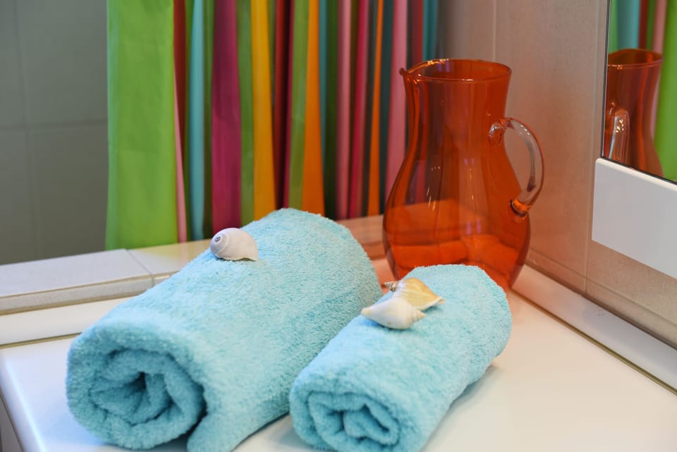 Apartment, 3 Bedrooms | Bathroom amenities | Shower, hair dryer, towels, soap