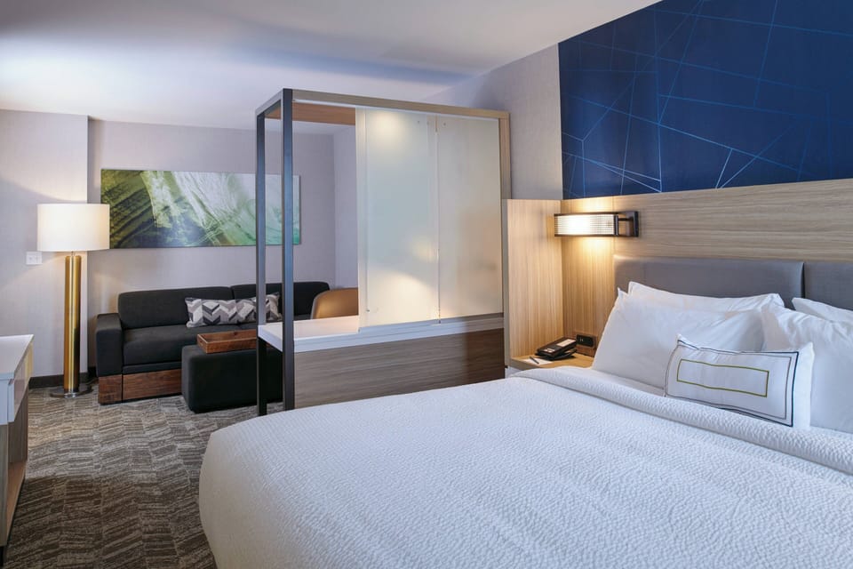 Premium bedding, pillowtop beds, desk, laptop workspace