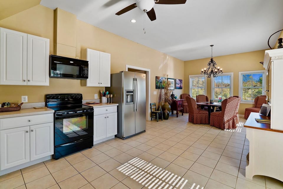 HUGE Fully equipped kitchen with eat-in area.