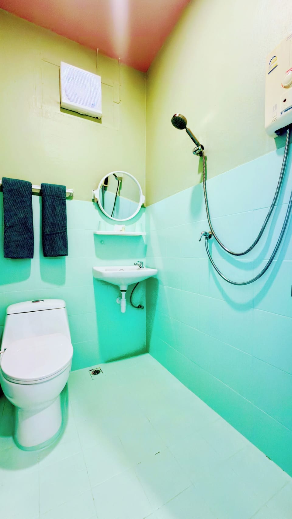 Shower, hydromassage showerhead, slippers, towels