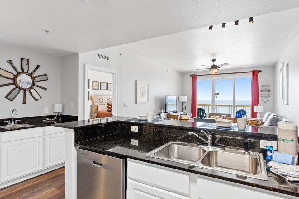 Fully Stocked Kitchen with Bar Seating