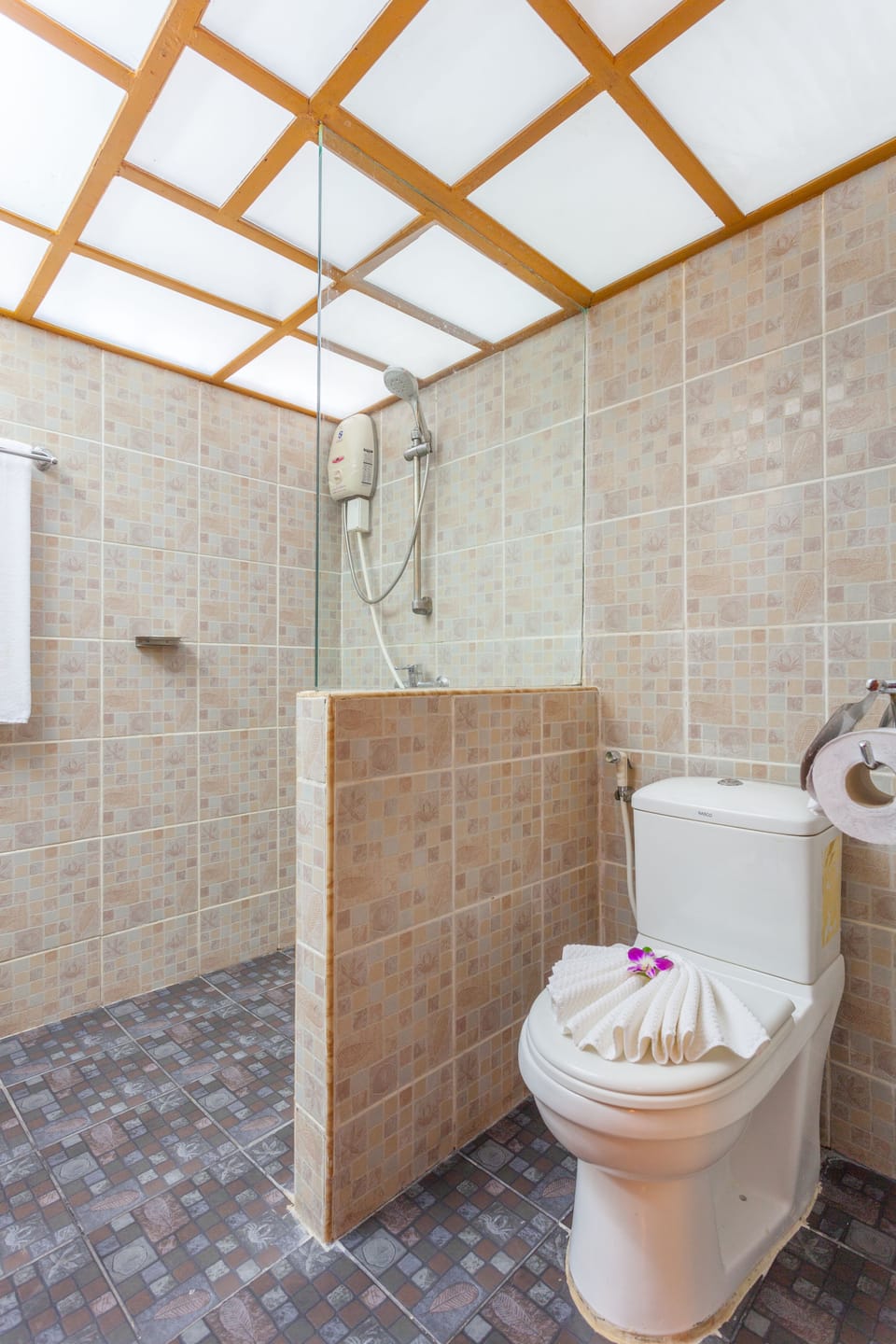 Shower, hair dryer, slippers, towels