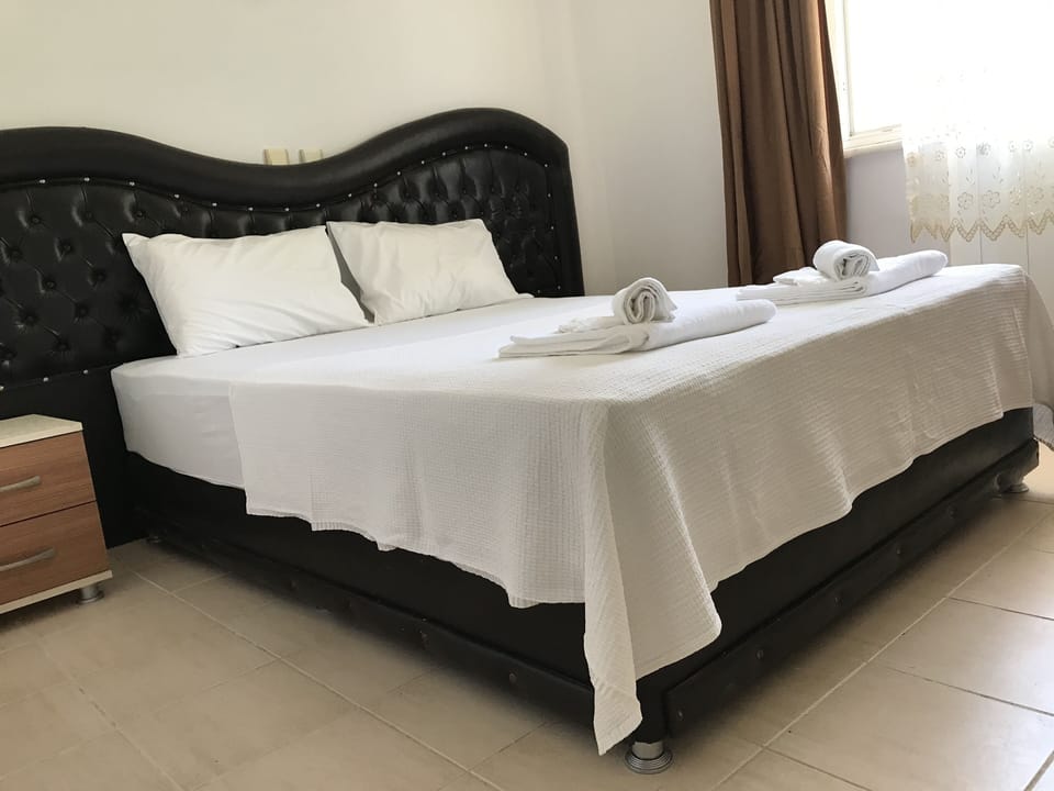 Desk, blackout drapes, WiFi (free), bed sheets