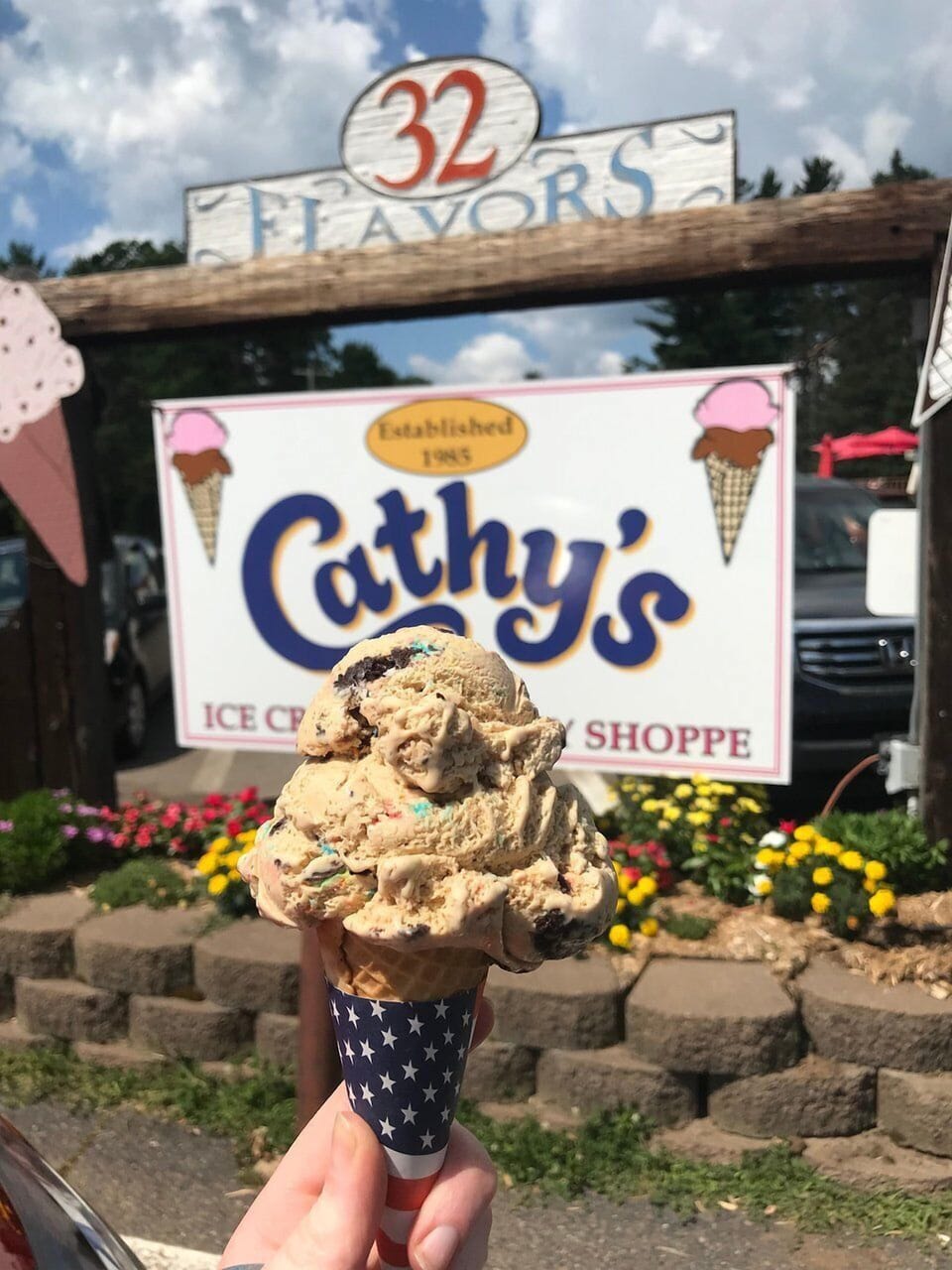 Cool off with an ice cream cone at Cathy's Ice Cream n' Candy Shoppe. Keep coming back until you've tried all 32 flavors!