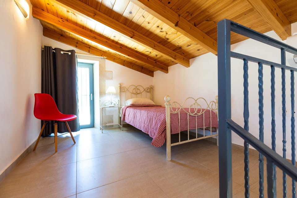 Attic with a single bed.