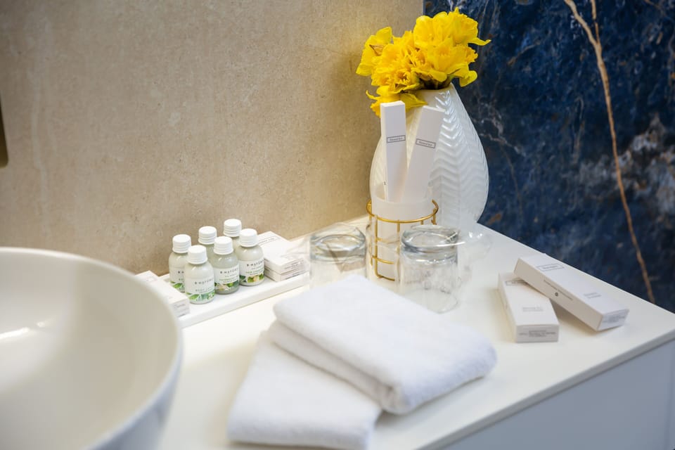 Family Suite, 1 King Bed, Balcony, Sea View | Bathroom | Eco-friendly toiletries, hair dryer, slippers, towels