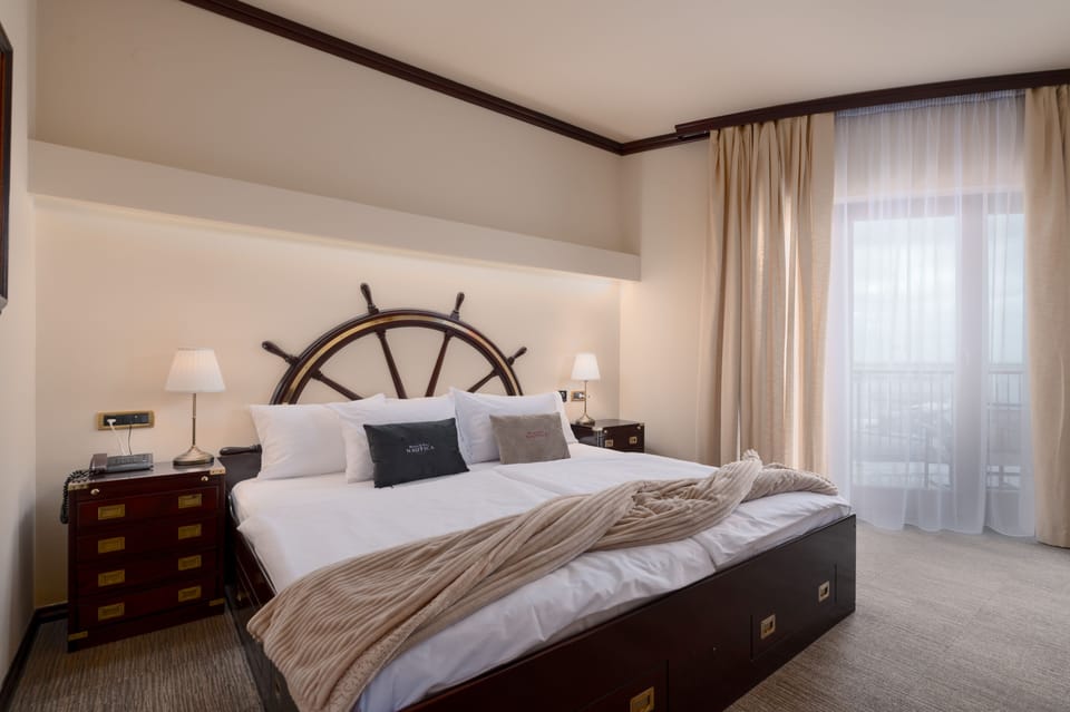 Family Suite Deluxe, 2 Bedrooms, Balcony, Sea View | Premium bedding, minibar, in-room safe, desk