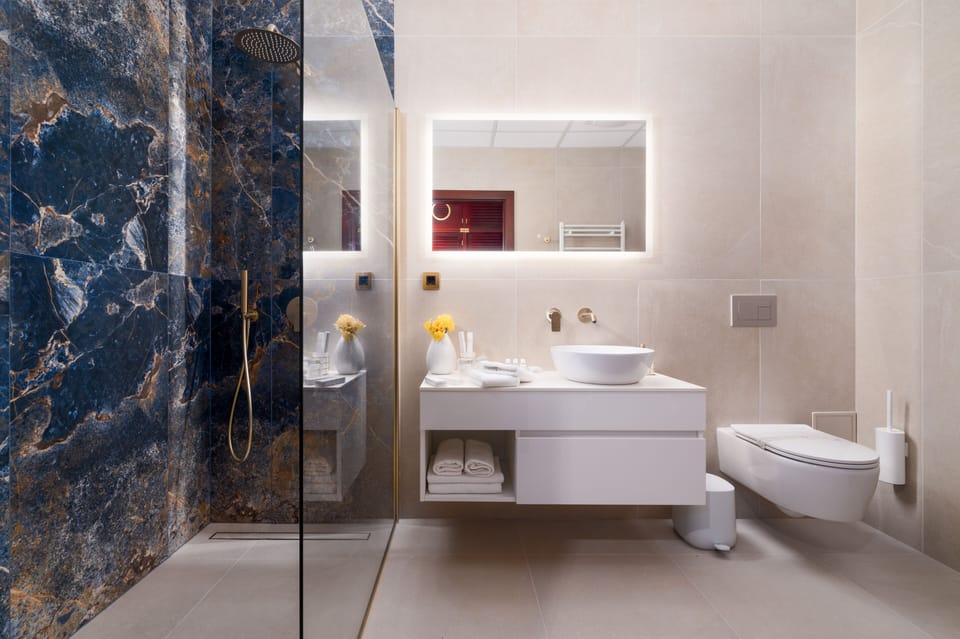 Eco-friendly toiletries, hair dryer, slippers, towels
