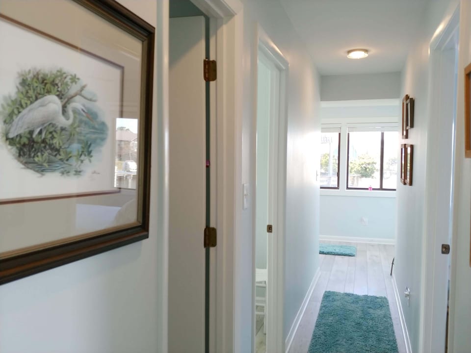 Looking down hallway to den