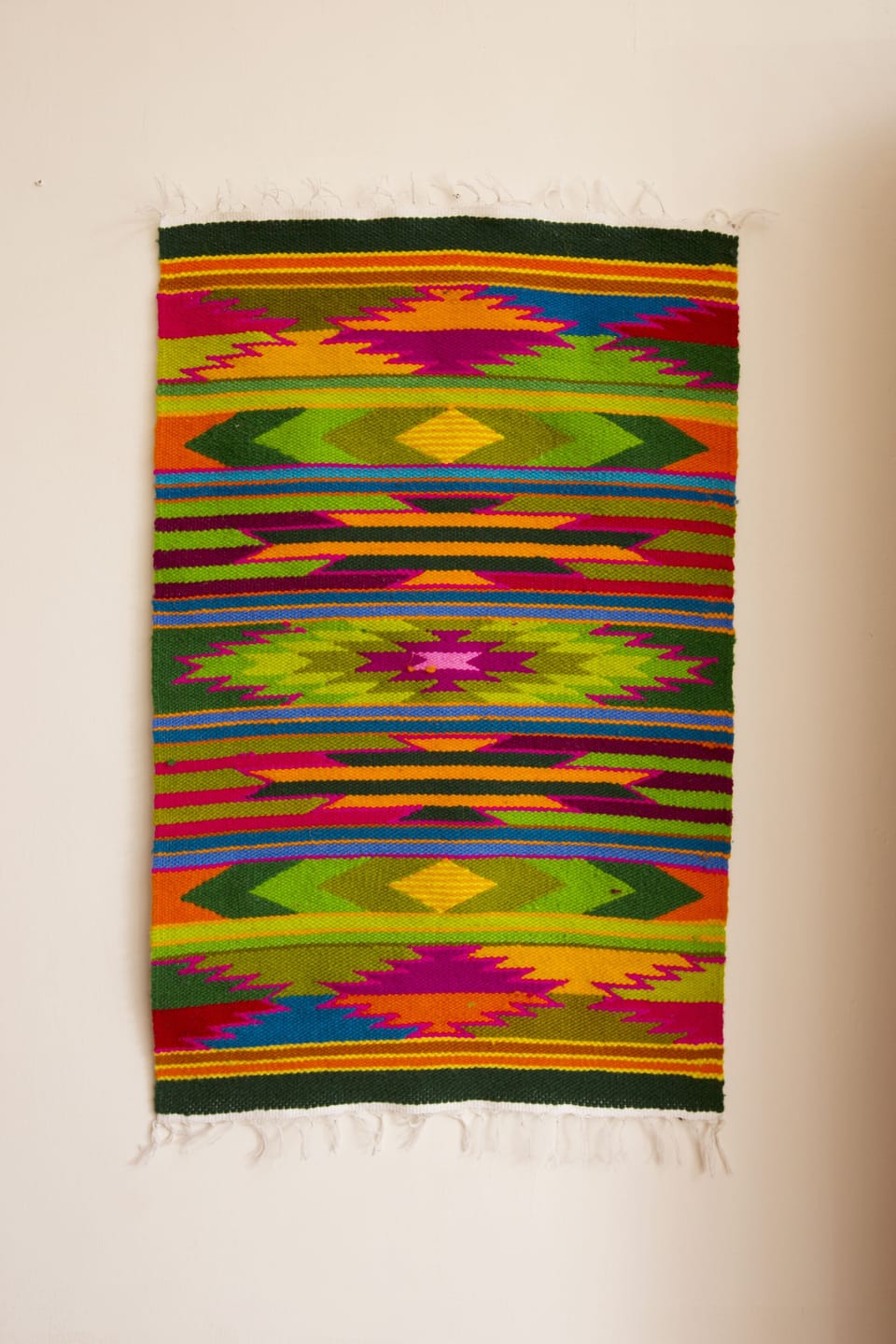Ecuadorian tapestry adorning living room