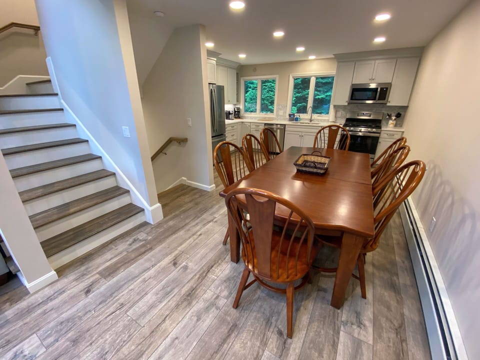 Open concept living room, dining area and kitchen