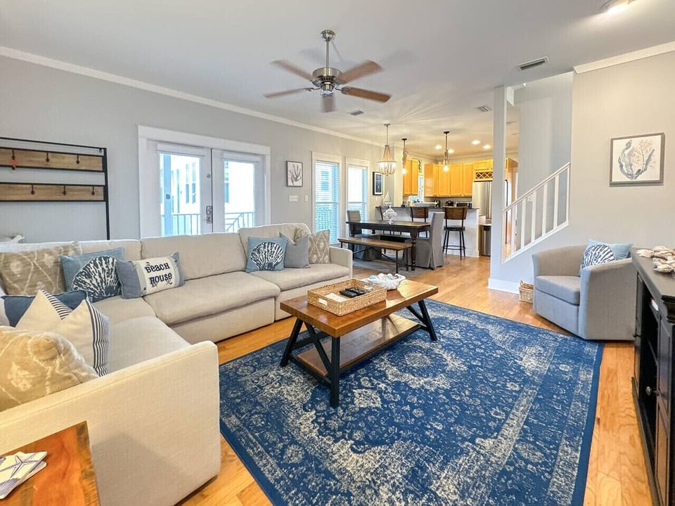 Relax in the first-floor living area with smart TV & large sectional