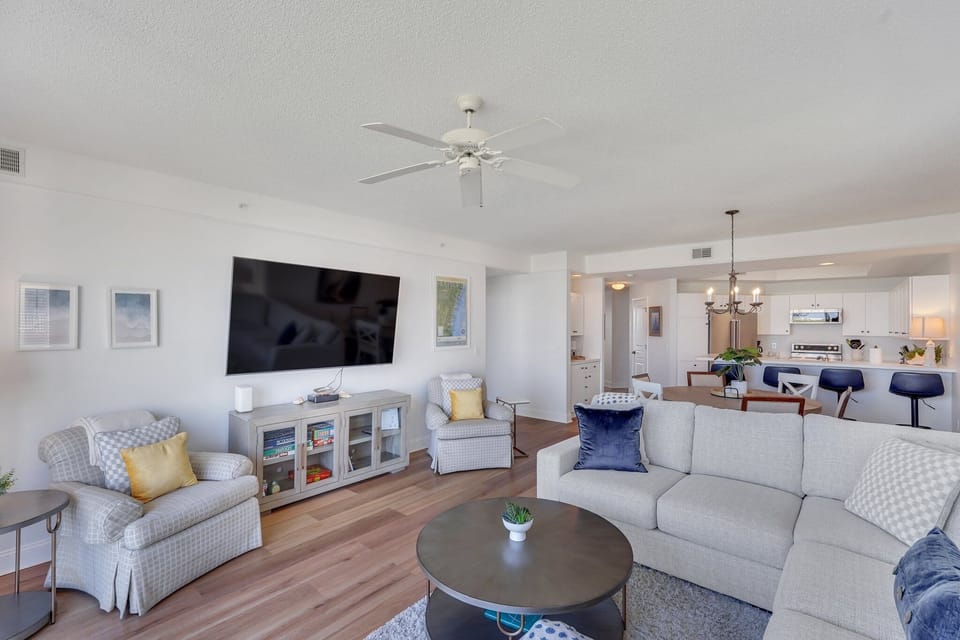 Living room featuring a 65-inch smart tv for the ultimate streaming experience.