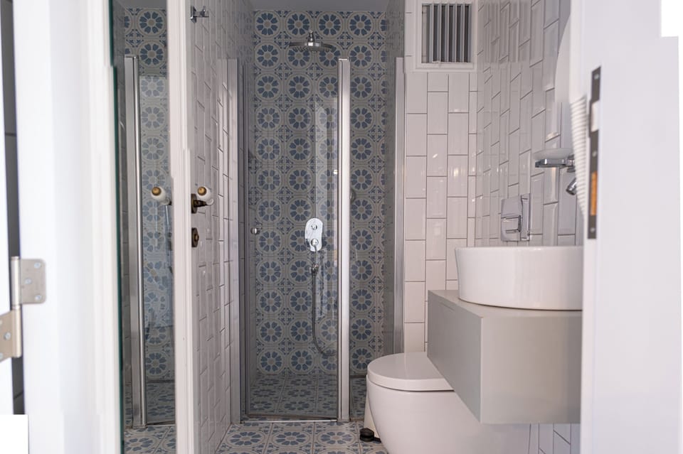 Shower, hair dryer, slippers, heated floors