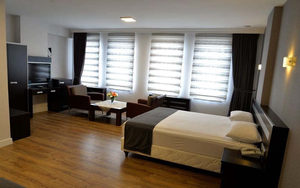 Deluxe Suite, City View | Egyptian cotton sheets, premium bedding, memory foam beds, desk