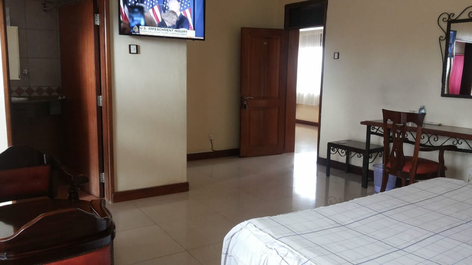 Executive Double Room, Garden View | Individually decorated, individually furnished, desk, laptop workspace