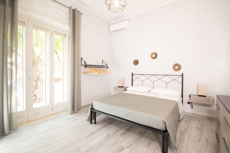 Deluxe Room, 1 Queen Bed with Sofa bed, Balcony | 1 bedroom, individually decorated, individually furnished