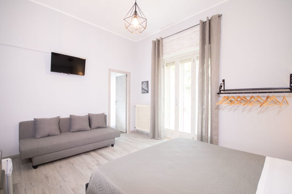 Deluxe Room, 1 Queen Bed with Sofa bed, Balcony | 1 bedroom, individually decorated, individually furnished