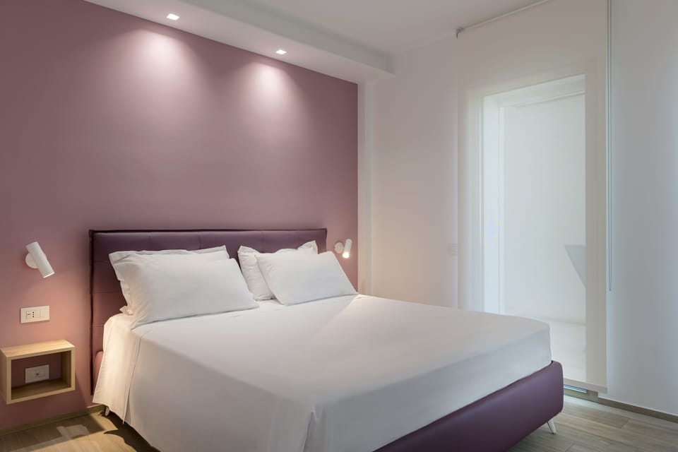 Family Suite | In-room safe, desk, blackout drapes, soundproofing