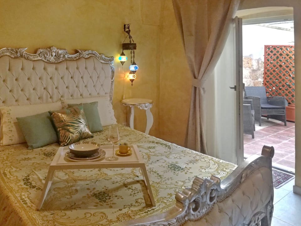 Deluxe Suite, Garden View | Desk, laptop workspace, blackout drapes, iron/ironing board (on request)
