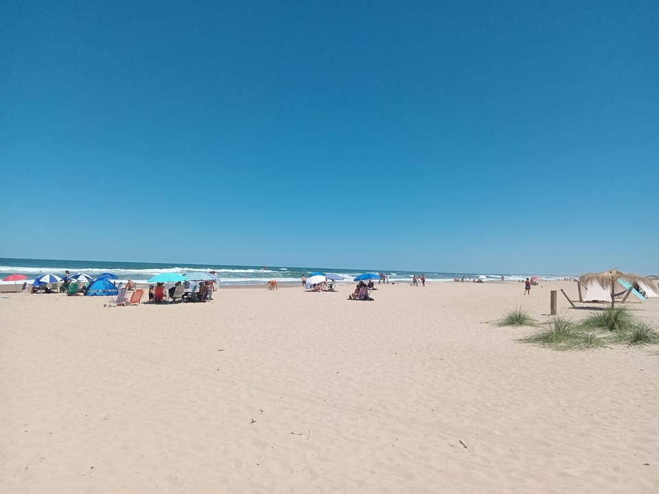 Beach nearby, white sand, sun loungers, beach umbrellas
