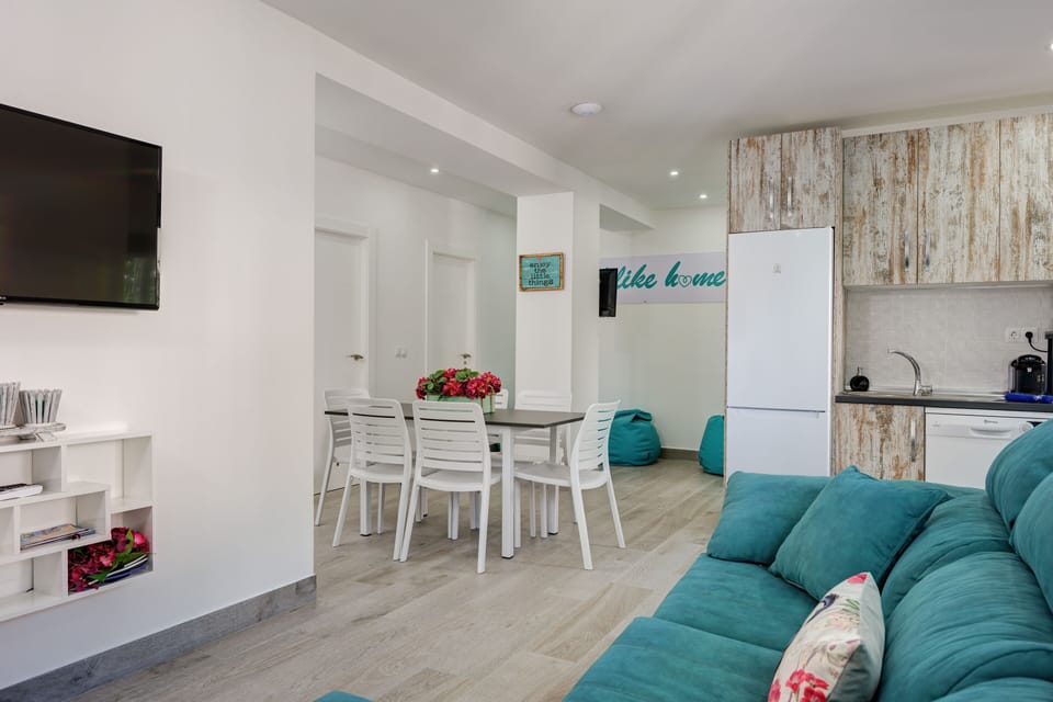 Premium Villa, 3 Bedrooms (Villa Isabel By Seric) | Living room | 50-inch flat-screen TV with cable channels, TV