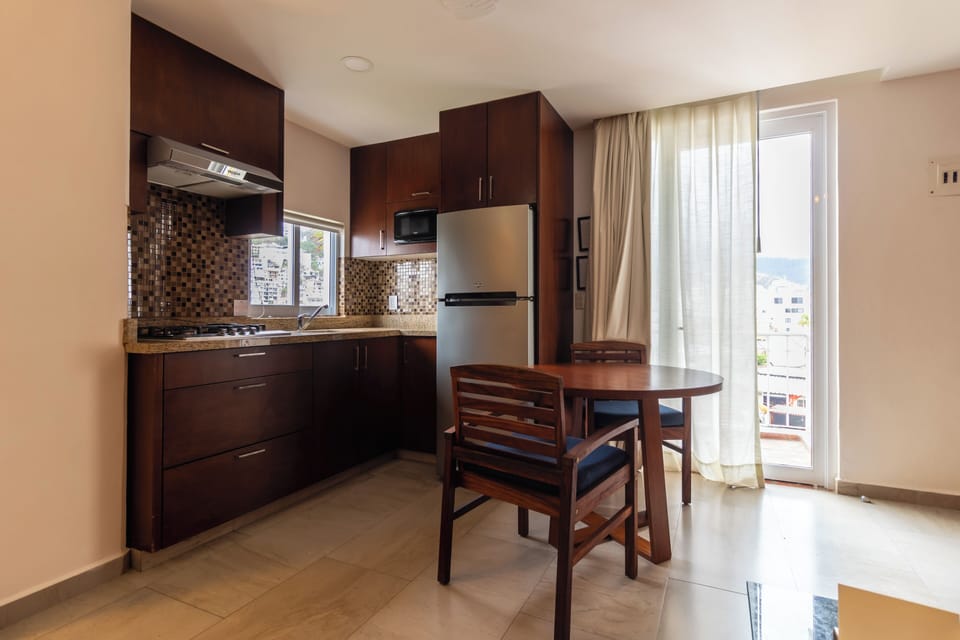 King Suite with Town & Mountain View | Private kitchen | Microwave, stovetop, coffee/tea maker, toaster