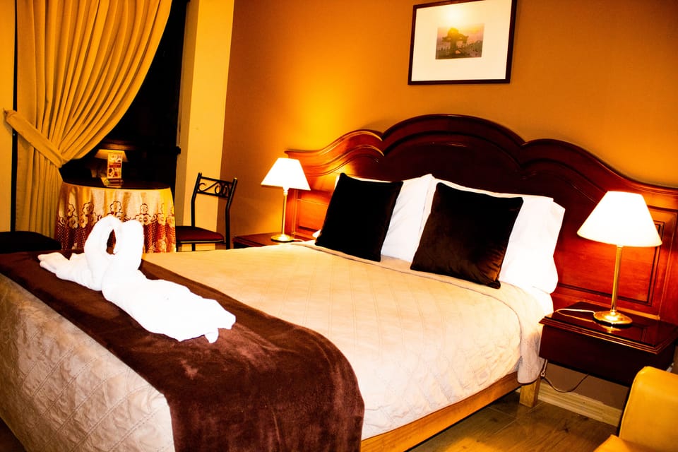 Executive Room | 8 bedrooms, in-room safe, desk, laptop workspace